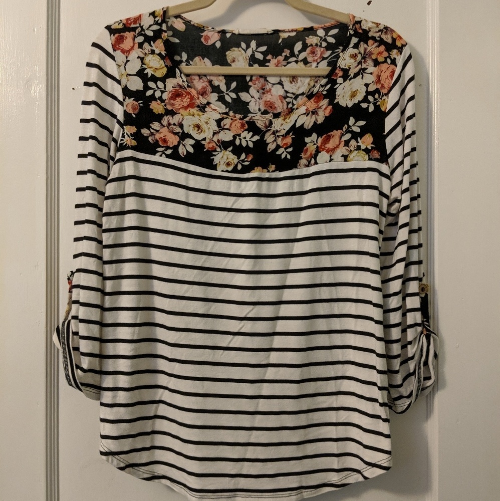 BW striped top with floral accent